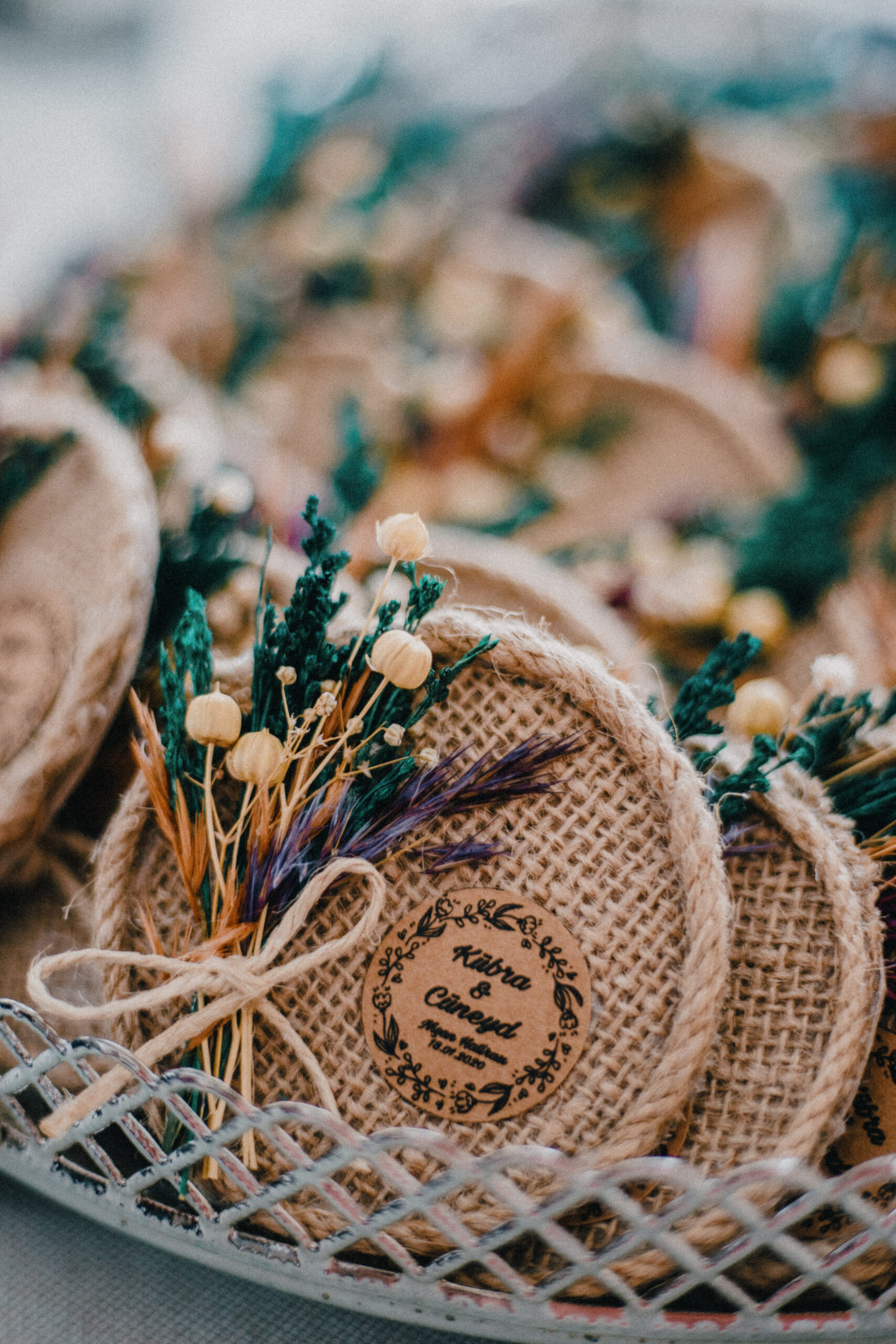 Rustic wedding favours decorated with dried flowers